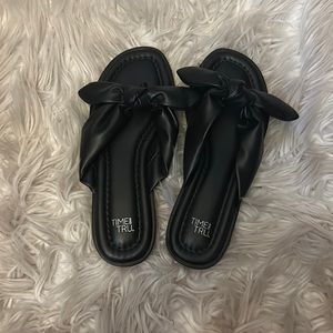 Women black flip flops size 7